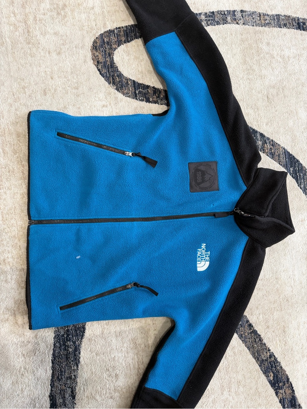 The North Face Blue and Black Kids Fleece Jacket